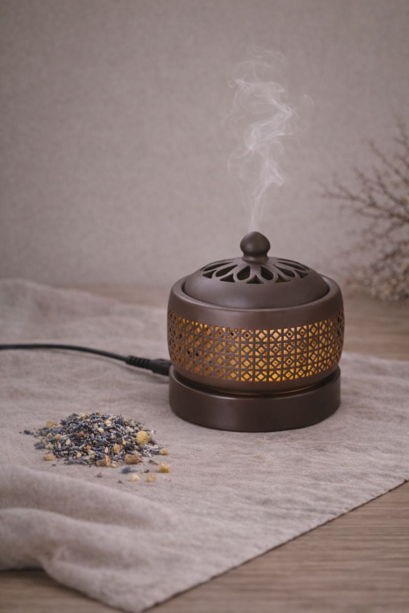Incalzitor electric din ceramica utilizat cu blend botanic, pentru incalzire aromatica fara foc deschis